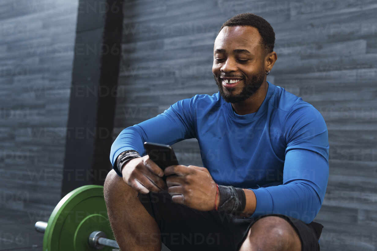 Barcelona, Spain. Confident muscular sportsman exercising in the
